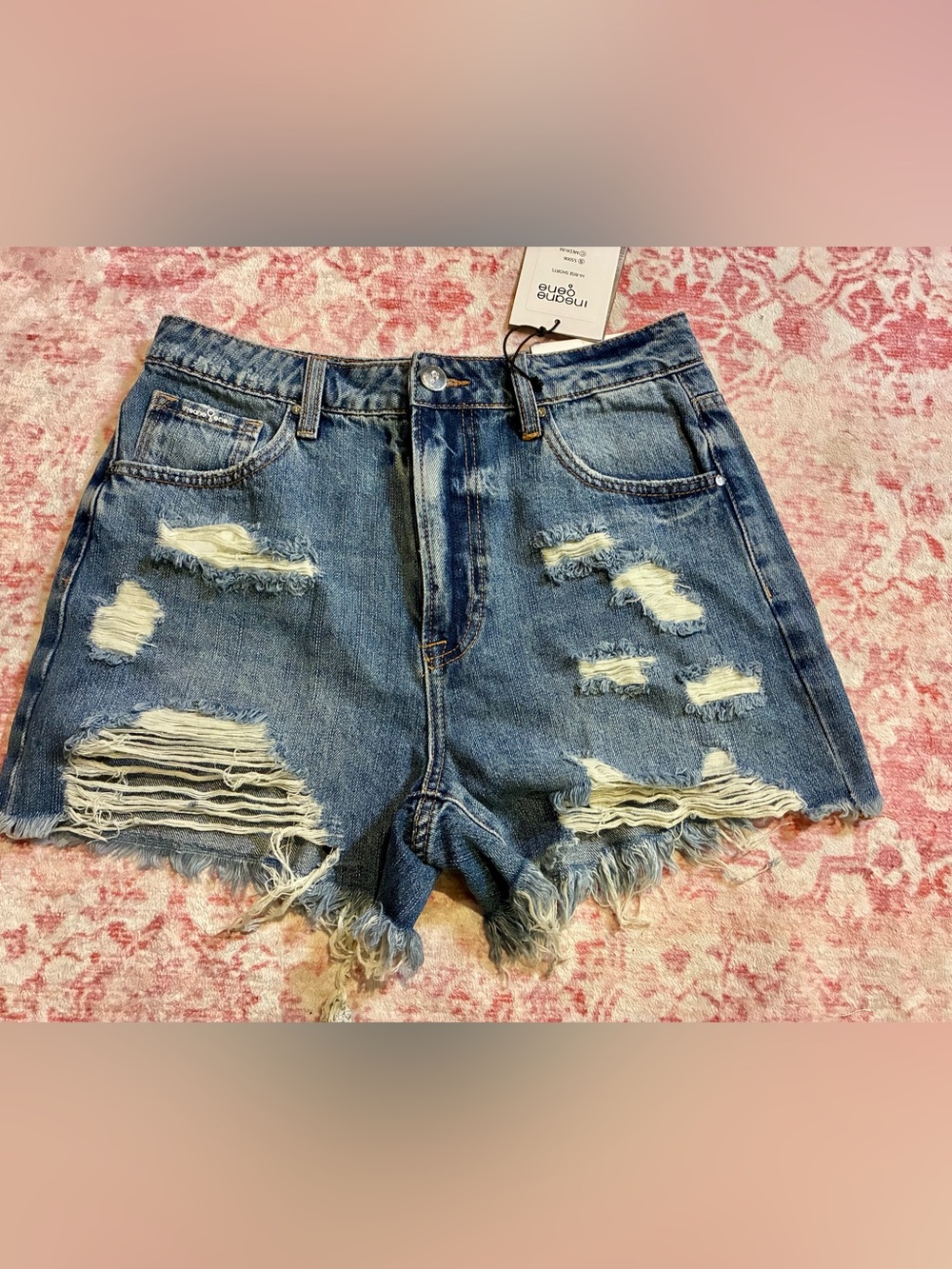 Ripped Cutie distressed denim shorts by Insane Gene